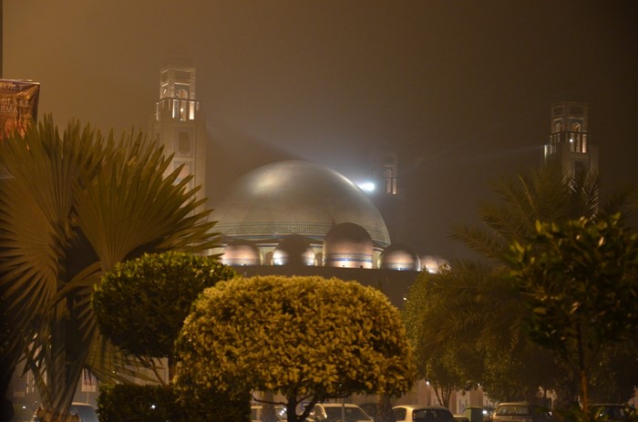 Mosque with minarets at night in Lahore, Pakistan