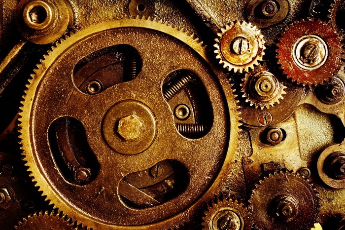 Close-up of intricate brass gears and springs