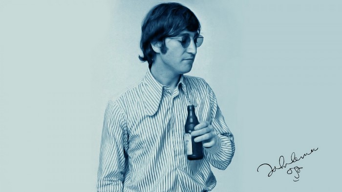John Lennon holding a bottle