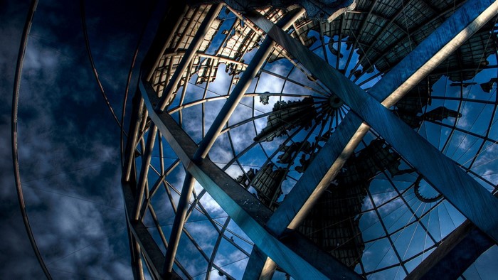 The Unisphere Globe Structure Against a Cloudy Sky