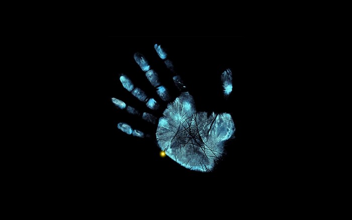 Handprint on black background