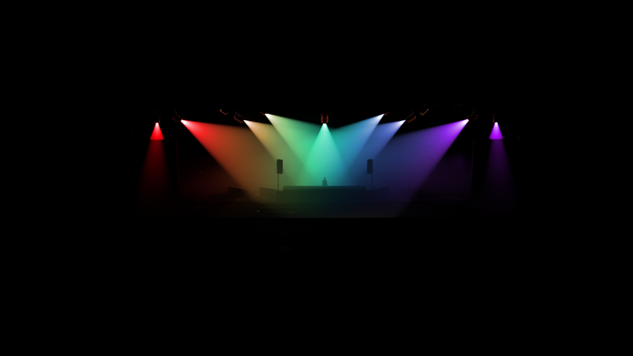 Stage with colorful spotlights and DJ booth