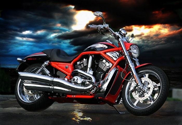 Red Harley Davidson VRSC motorcycle on a dark background
