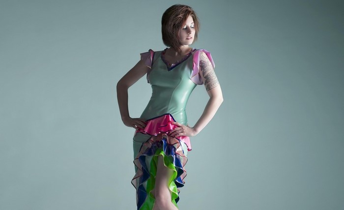 Woman in a colorful latex dress
