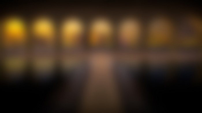 Blurred lights and reflections in darkness