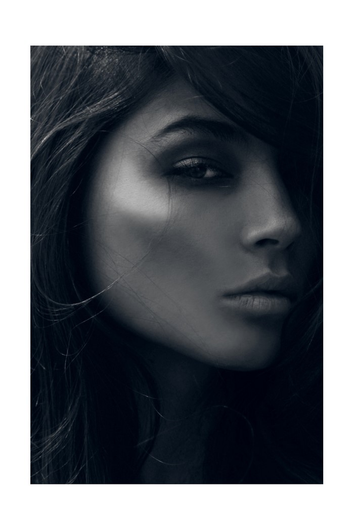 Monochrome portrait of a woman with long hair