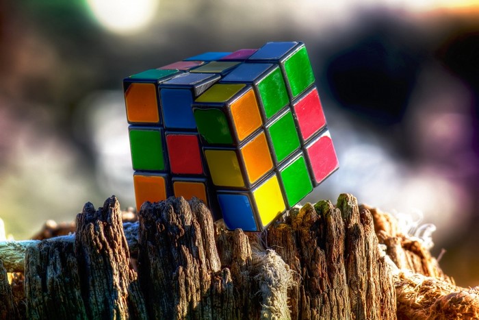 Colorful Rubik's Cube on Rustic Wood