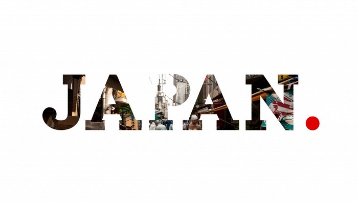 The word "JAPAN" with a Japanese flag dot