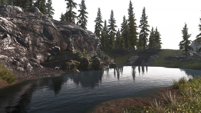 The Elder Scrolls V Skyrim lake with statue and trees