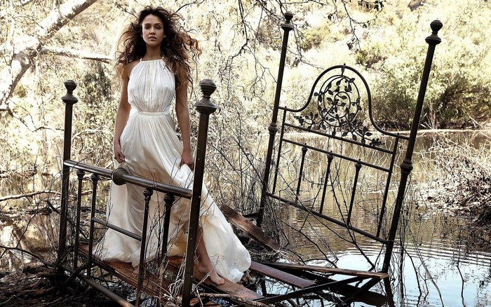 Jessica Alba in a white dress in a flooded forest