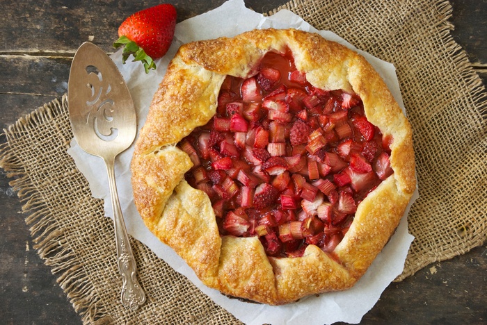 Strawberry Rhubarb Galette with a Serving Spatula