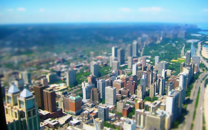 Aerial view of a city skyline with tilt-shift effect
