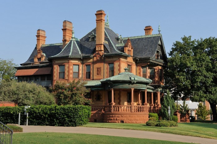 Victorian Mansion with Turrets and Chimneys