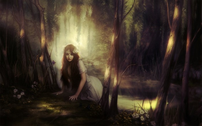 Woman in a mystical forest with sunlight