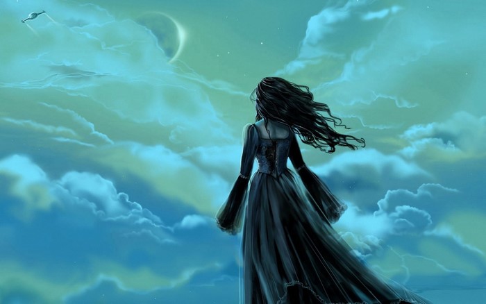 Woman in dark dress looking at the sky with clouds and moon