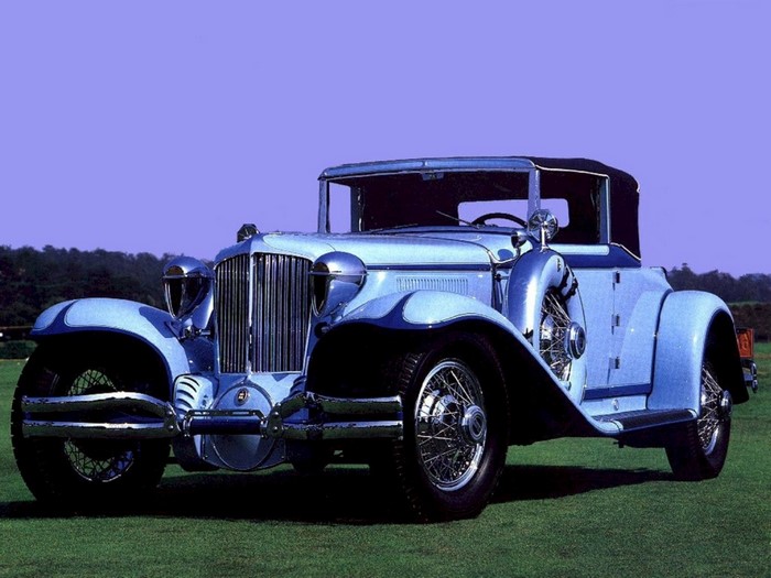 Light blue vintage convertible touring car