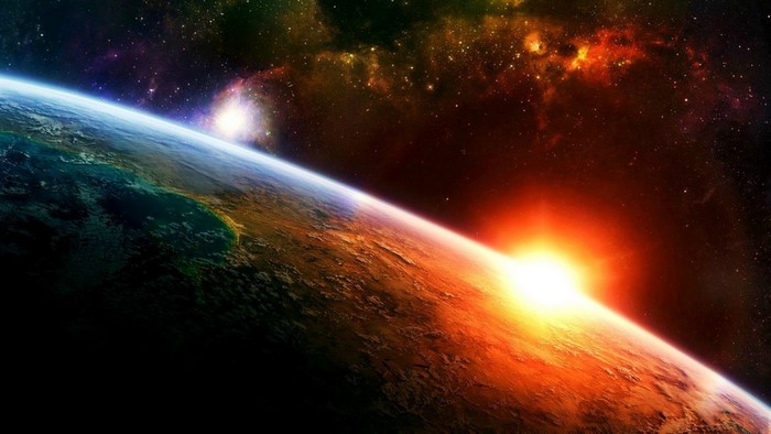Sunrise over planet Earth from space
