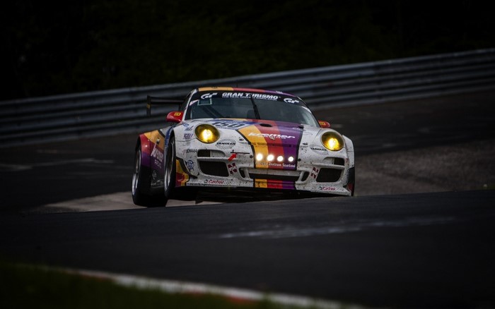 Porsche 911 GT3 race car on track