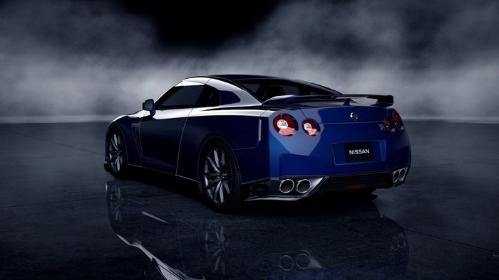 Blue Nissan GT-R Coupe on a Dark Surface