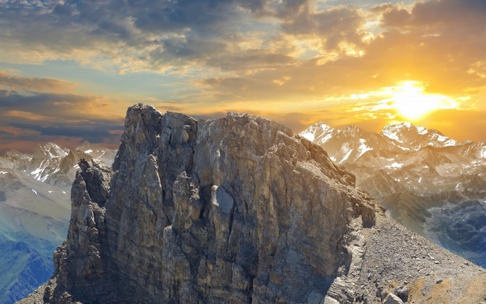 Sunset Over Rugged Mountain Ridge