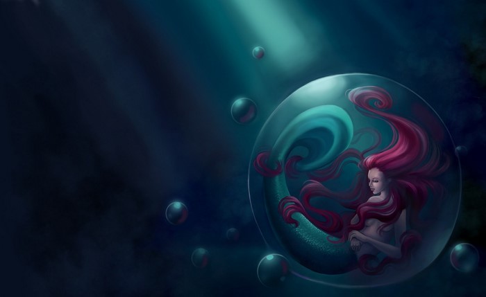 Mermaid in a bubble underwater
