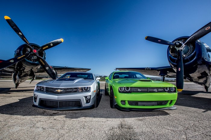 Chevrolet Camaro and Dodge Challenger with Grumman F8F Bearcat aircraft