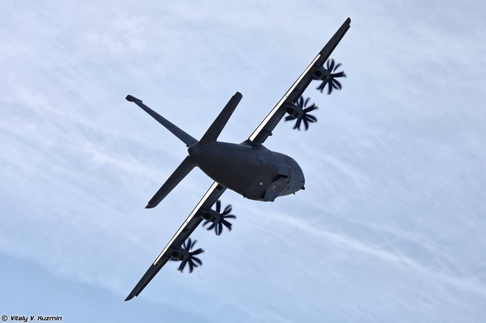 Military transport aircraft flying in the sky