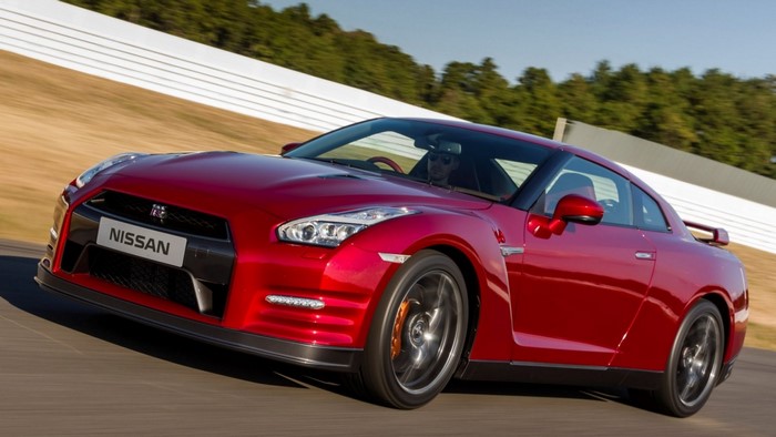Red Nissan GT-R sports car on a race track