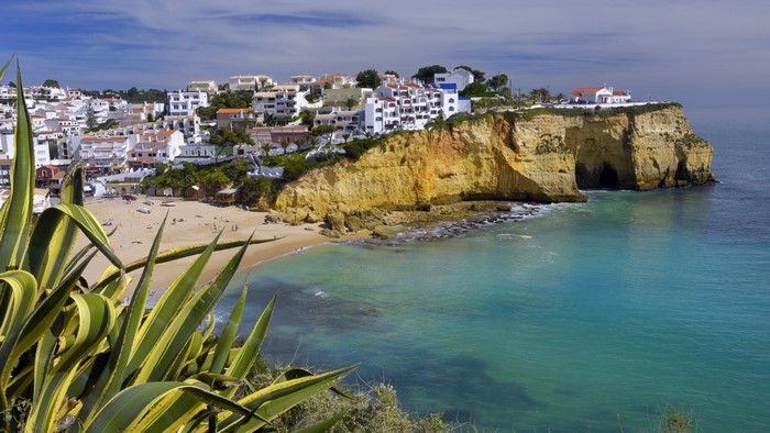 Coastal town with cliffs and a beach
