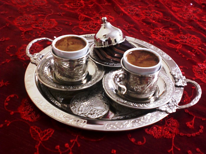 Turkish coffee set on a red tablecloth