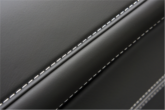 Black leather with white stitching detail