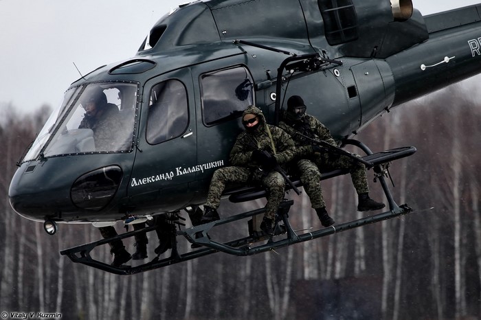 Russian Military Helicopter with Soldiers