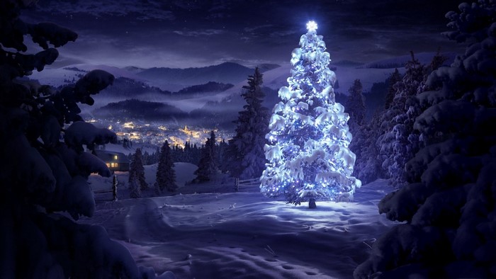 Snowy mountain village with a lit Christmas tree at night