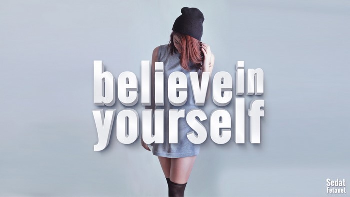 Woman with text "believe in yourself"