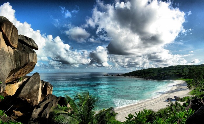 Tropical beach with granite boulders and turquoise water