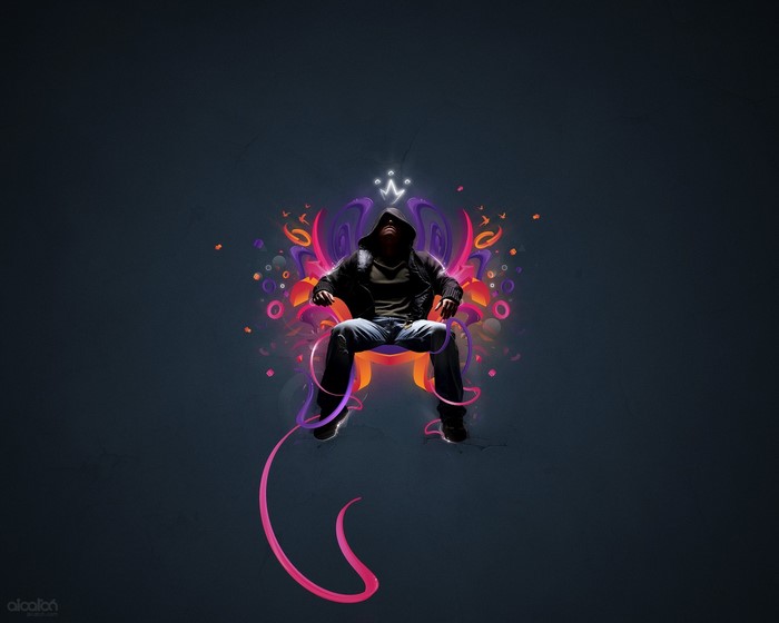 Man in hoodie sitting with colorful abstract art