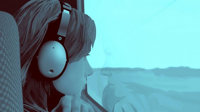 Girl with headphones looking out a window