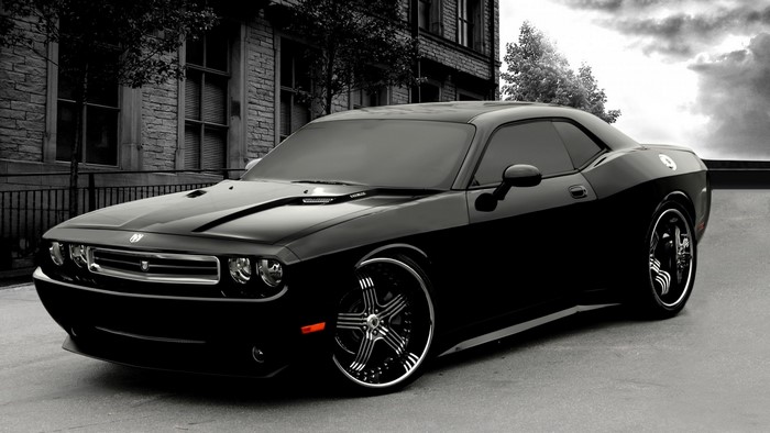 Black Dodge Challenger Muscle Car on Street