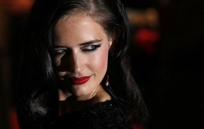 Eva Green with red lipstick and black hair