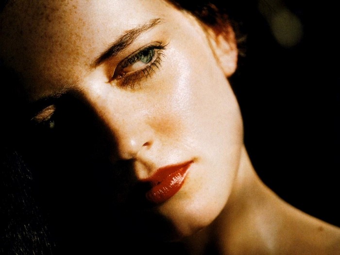 Close up portrait of Eva Green with red lipstick