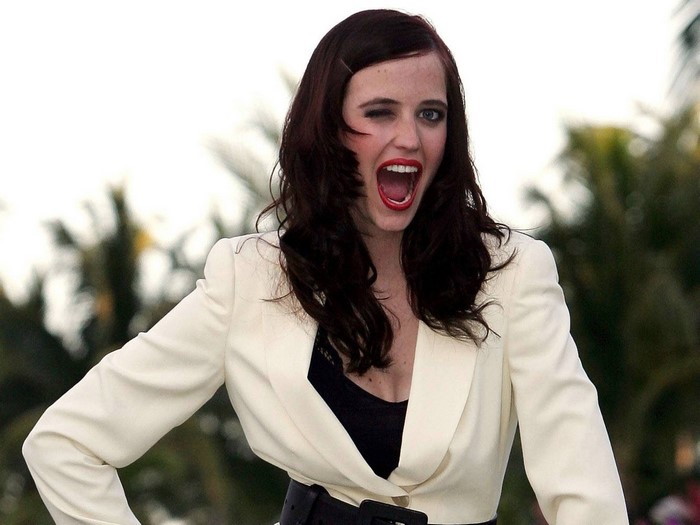 Eva Green winks and opens her mouth
