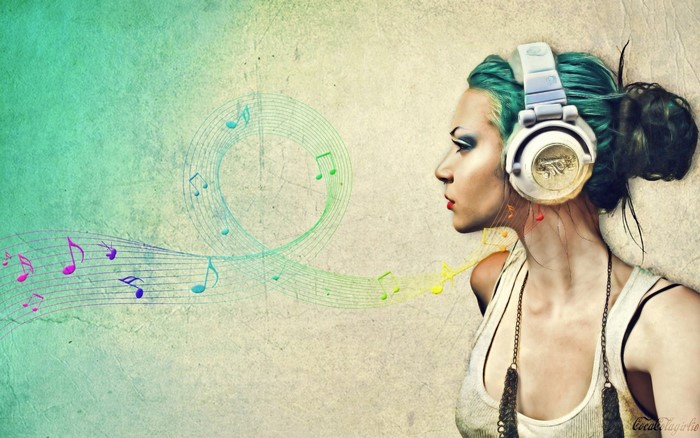 Woman with headphones listening to music with colorful notes