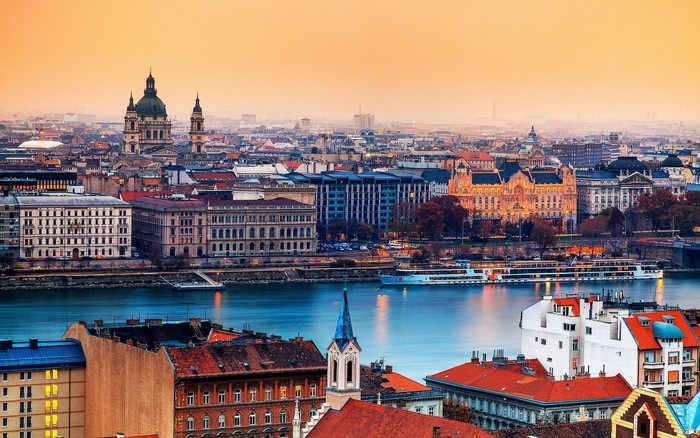 Budapest cityscape with Danube River and St. Stephen's Basilica at dusk