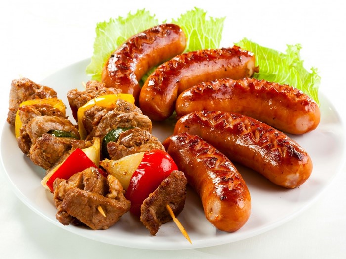 Grilled Sausages and Colorful Meat Kebabs Plate