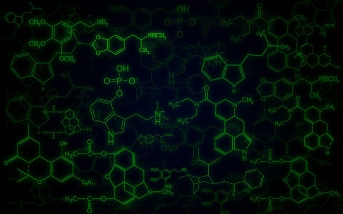 Green chemical structures on a dark background