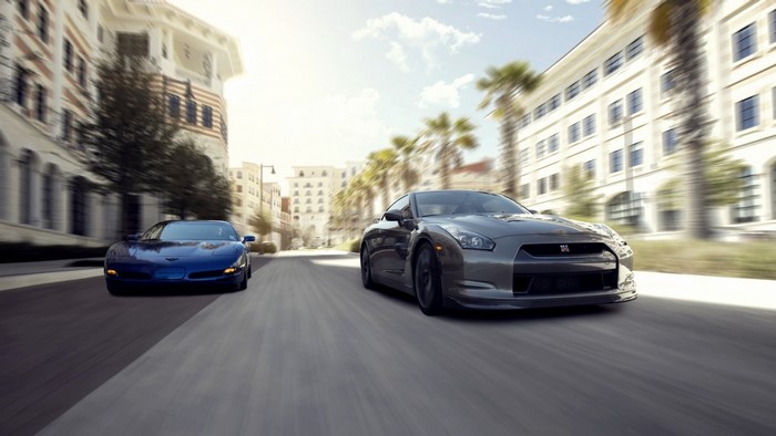Nissan GT R and Chevrolet Corvette driving on street