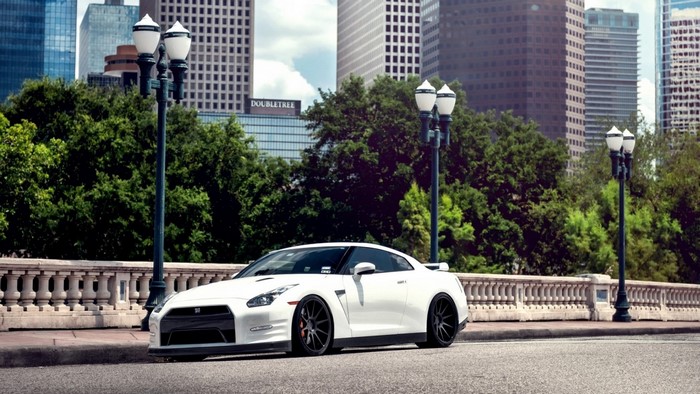 White Nissan GT-R parked on a city street