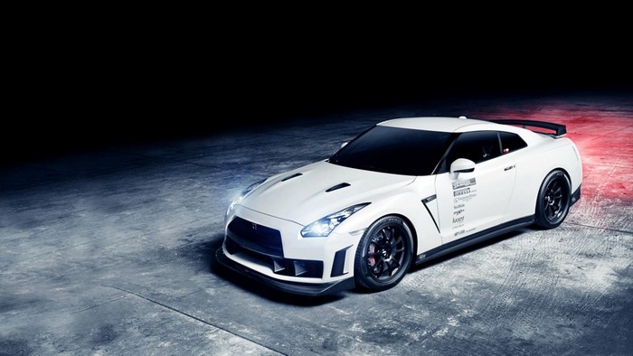 White Nissan GT-R sports car with racing decals