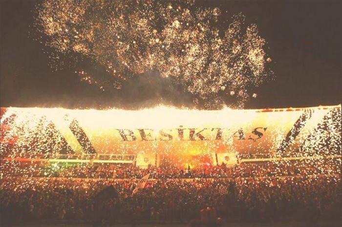 Besiktas stadium with fireworks and crowd