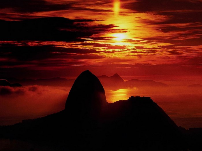 Sunset over mountains and sea in Brazil